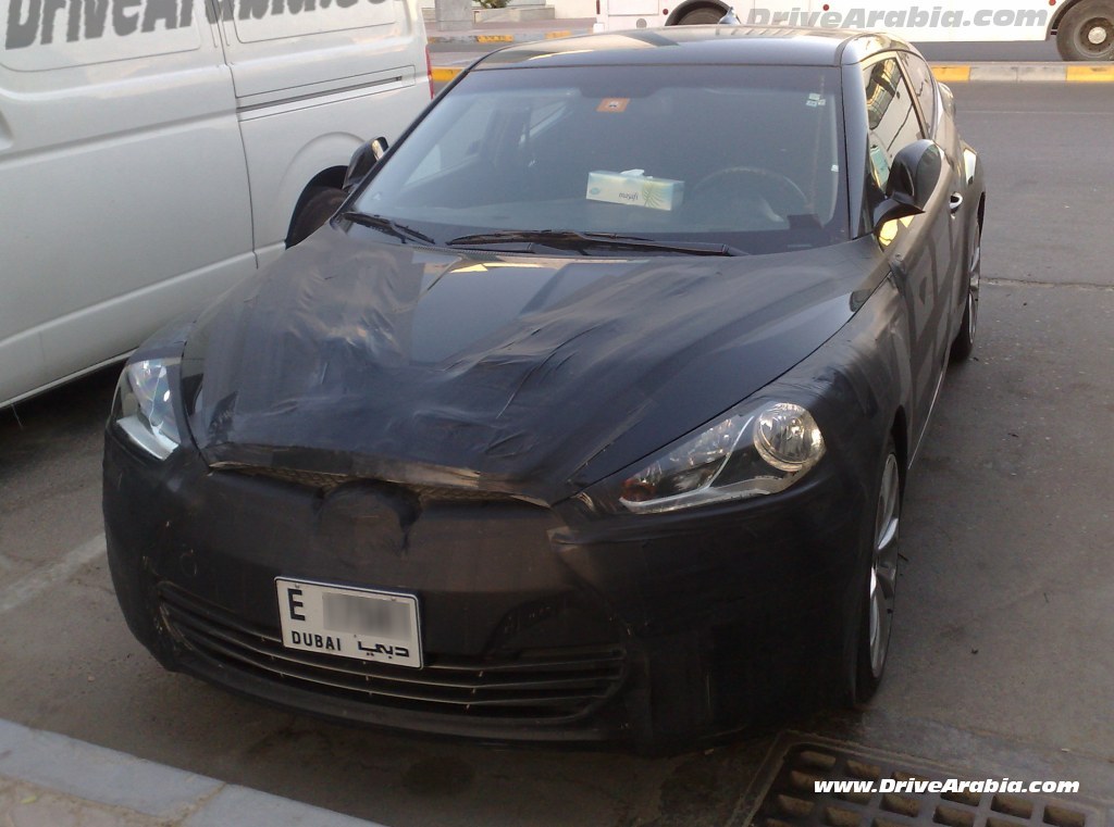 Hyundai Veloster 2012 sports coupe spied in Dubai