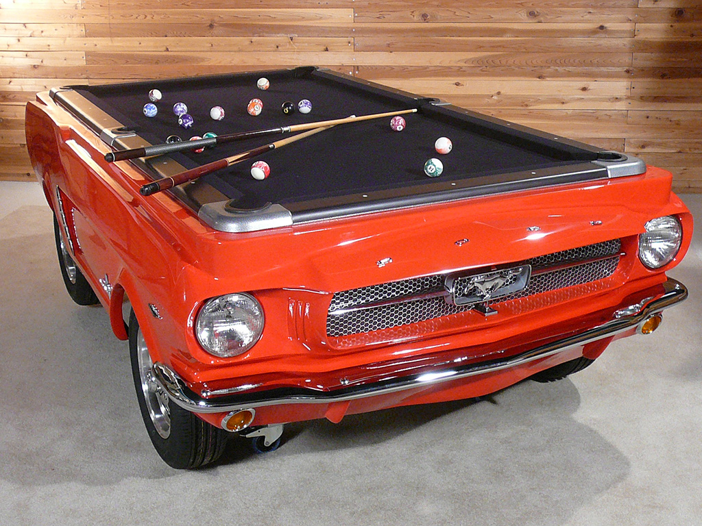 Enjoy a game of pool on a 1965 Ford Mustang